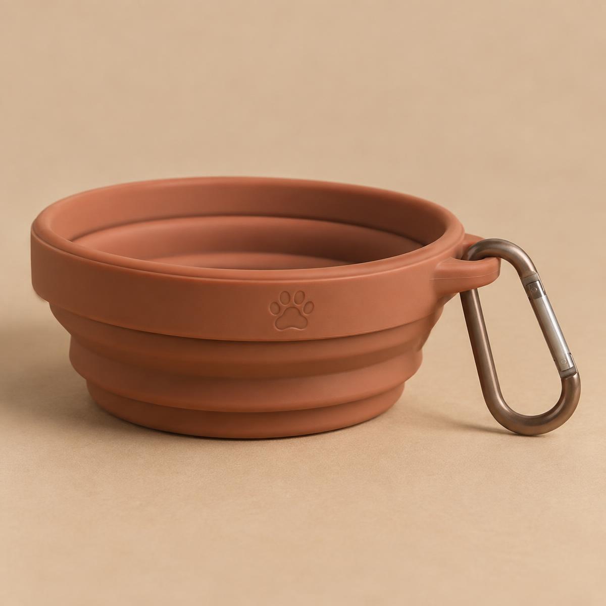 PackFlat collapsible dog travel bowl shown open beside its folded-flat profile with clip